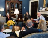 Joe Biden (right) at a meeting in the West Wing in 2013.